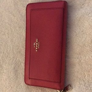 Gently used pink authentic Coach wallet.